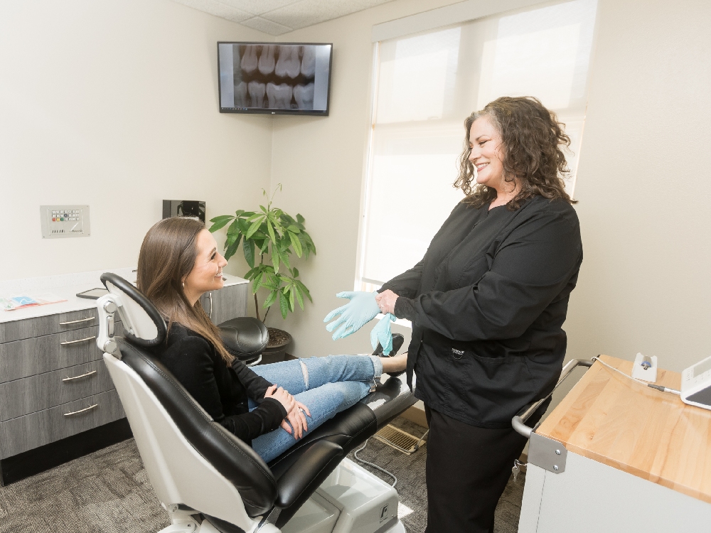 A patient receives a dental checkup